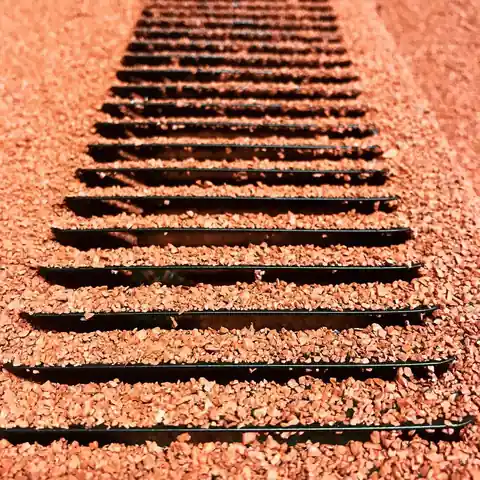 Red stone coated O'Hagin vent louvers up close